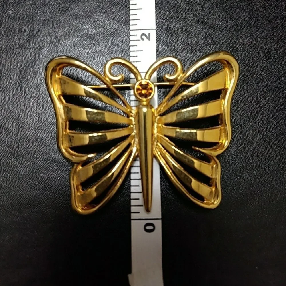 Vintage gold tone butterfly with rhinestone pin brooch